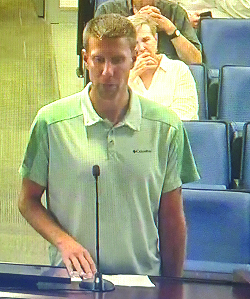 Pastor David McWilliams speaks to the Louisa County Planning Commission on Aug. 15 about allowing churches and other groups to provide warming shelters (photo by Linda Salisbury).